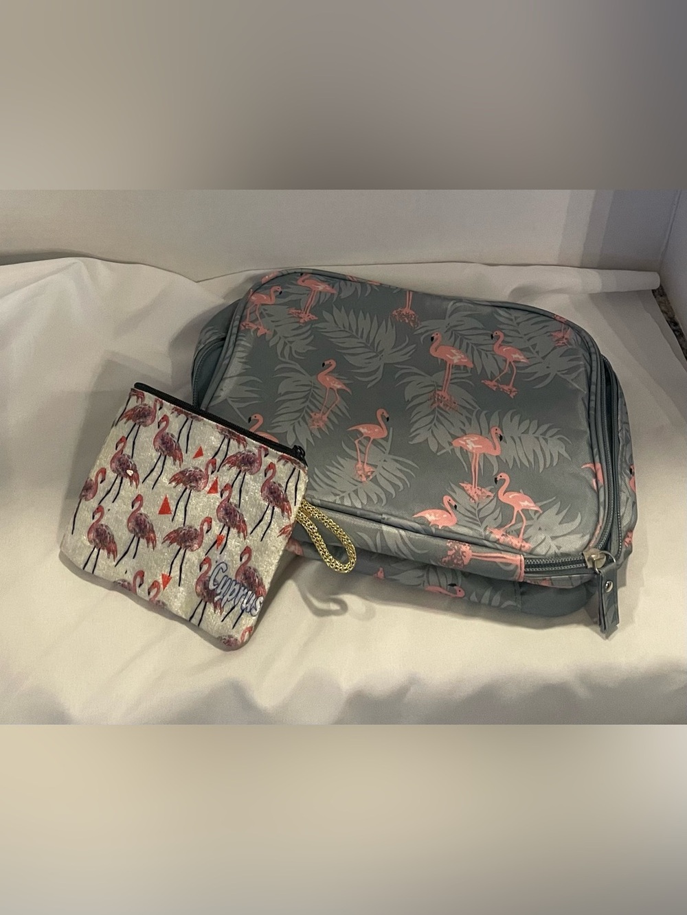 Flamingo print travel toiletry/cosmetic bag + matching small wristlet pouch set.